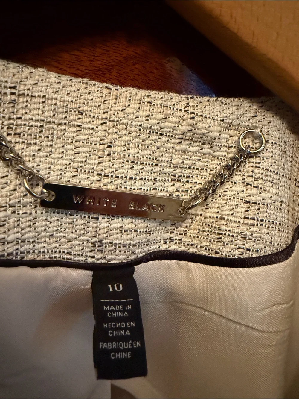 White House Black Market Cream Tweed Jacket with Black Trim Piping. Size 10.